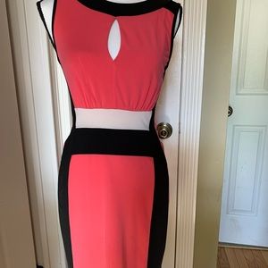 Slightly above Knee orange black & white dress